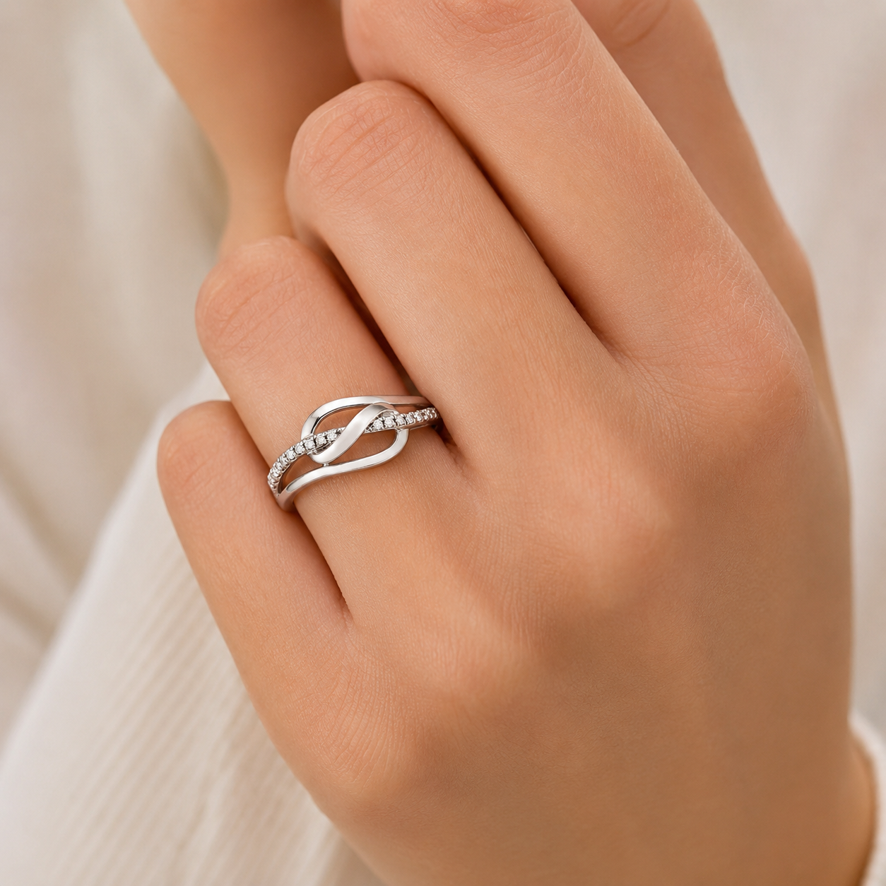 9ct white gold 0.07ct diamond set swirl ring