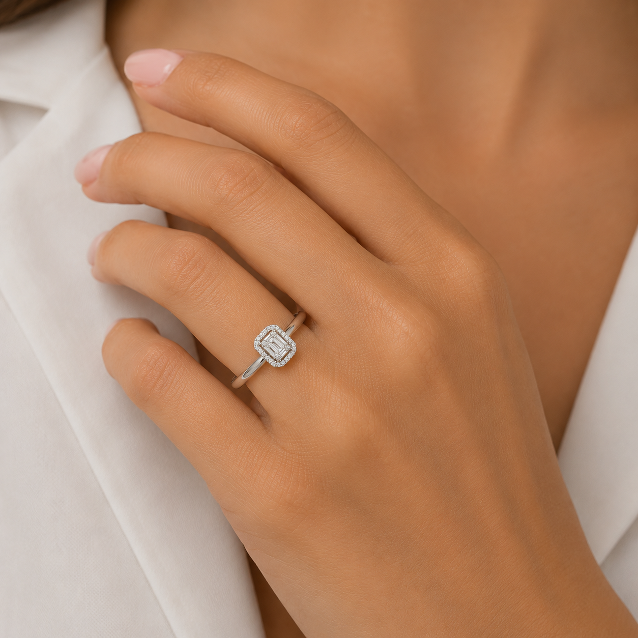 9ct white gold 0.18ct diamond baguette and round cluster with halo ring