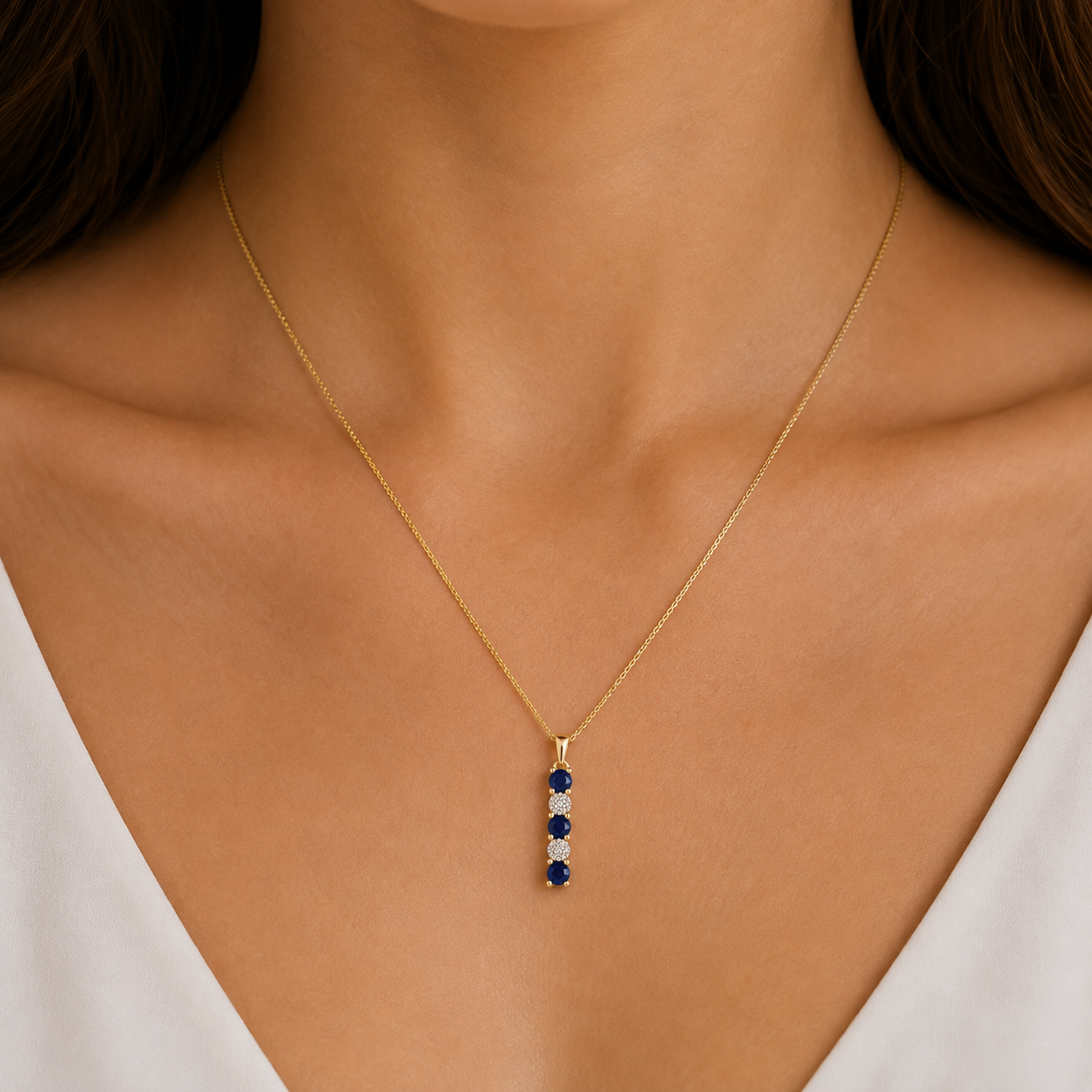 9ct yellow gold blue sapphire & 0.04ct diamond cluster pendant