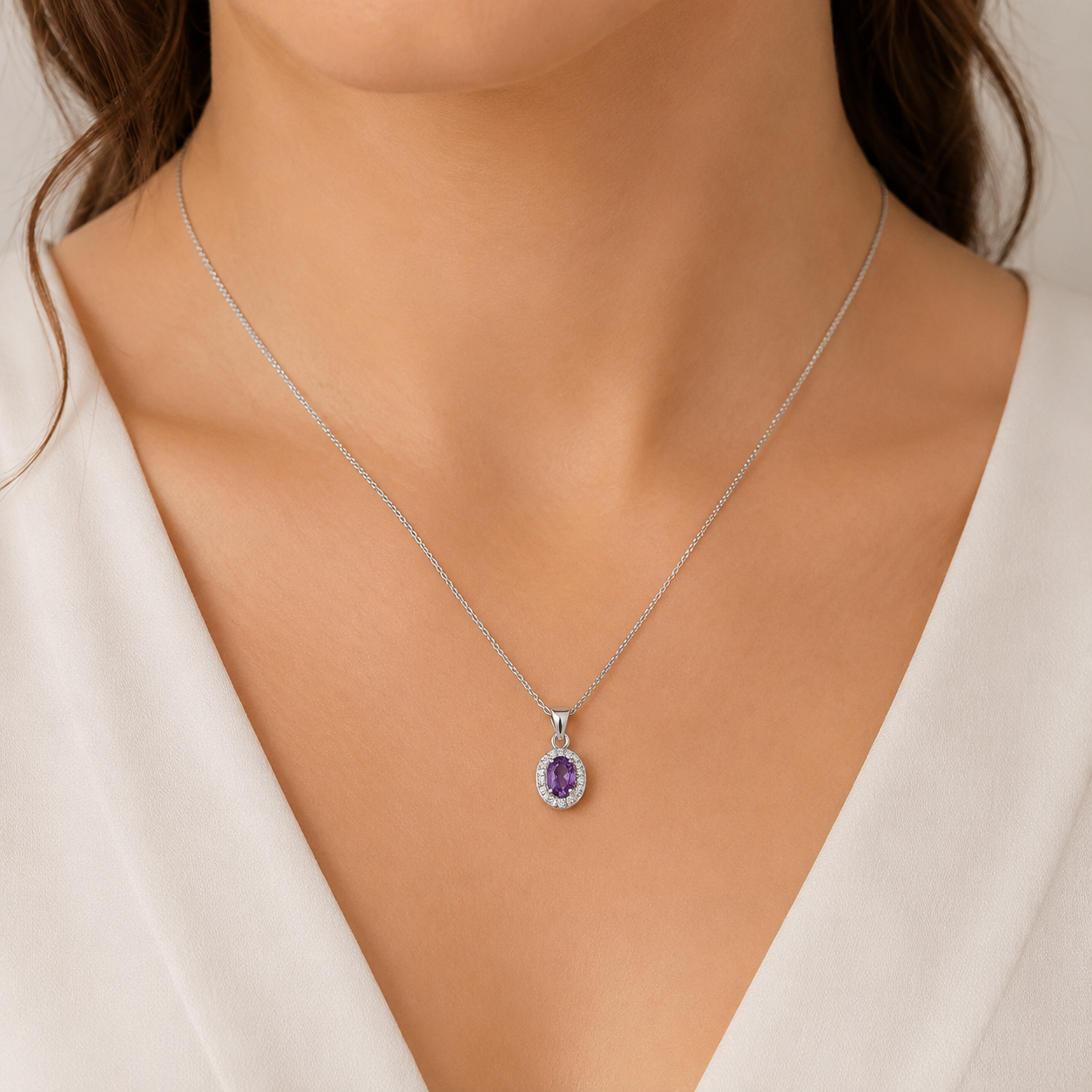 Sterling Silver purple cubic zirconia oval halo pendant with 45cm Chain