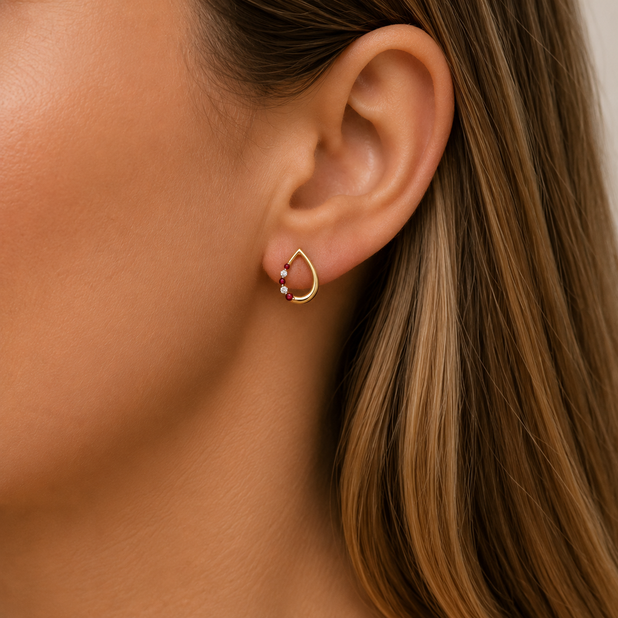 9ct yellow gold ruby & diamond pear shaped studs