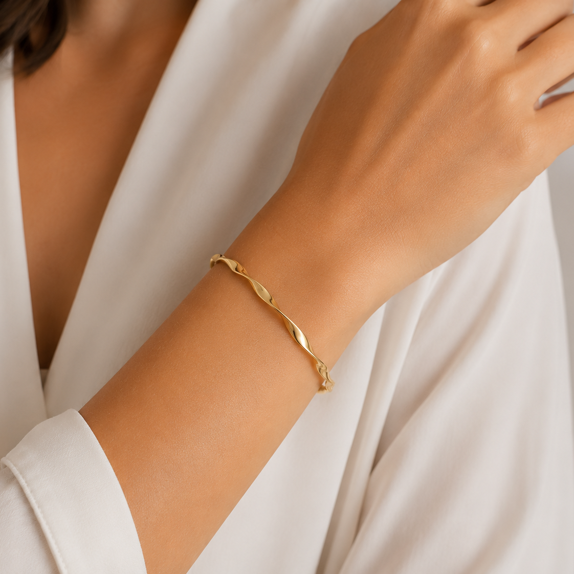 9ct yellow gold twist hinge bangle