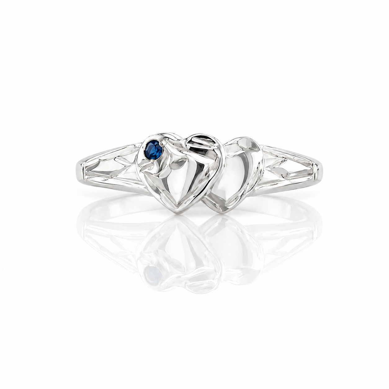Sterling Silver ring with a double heart design and a featured blue stone.