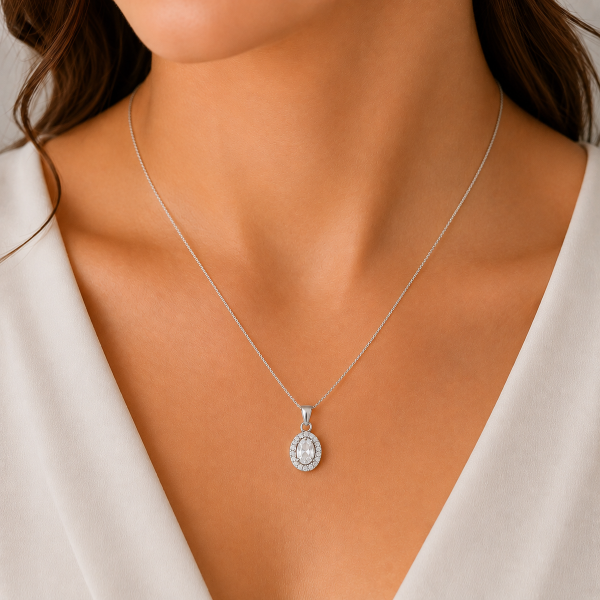 Sterling Silver cubic zirconia oval halo pendant