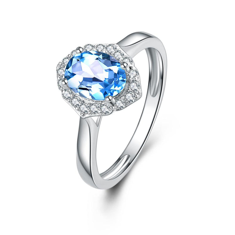 9ct White Gold Blue Topaz & 0.18ct Diamond Ring
